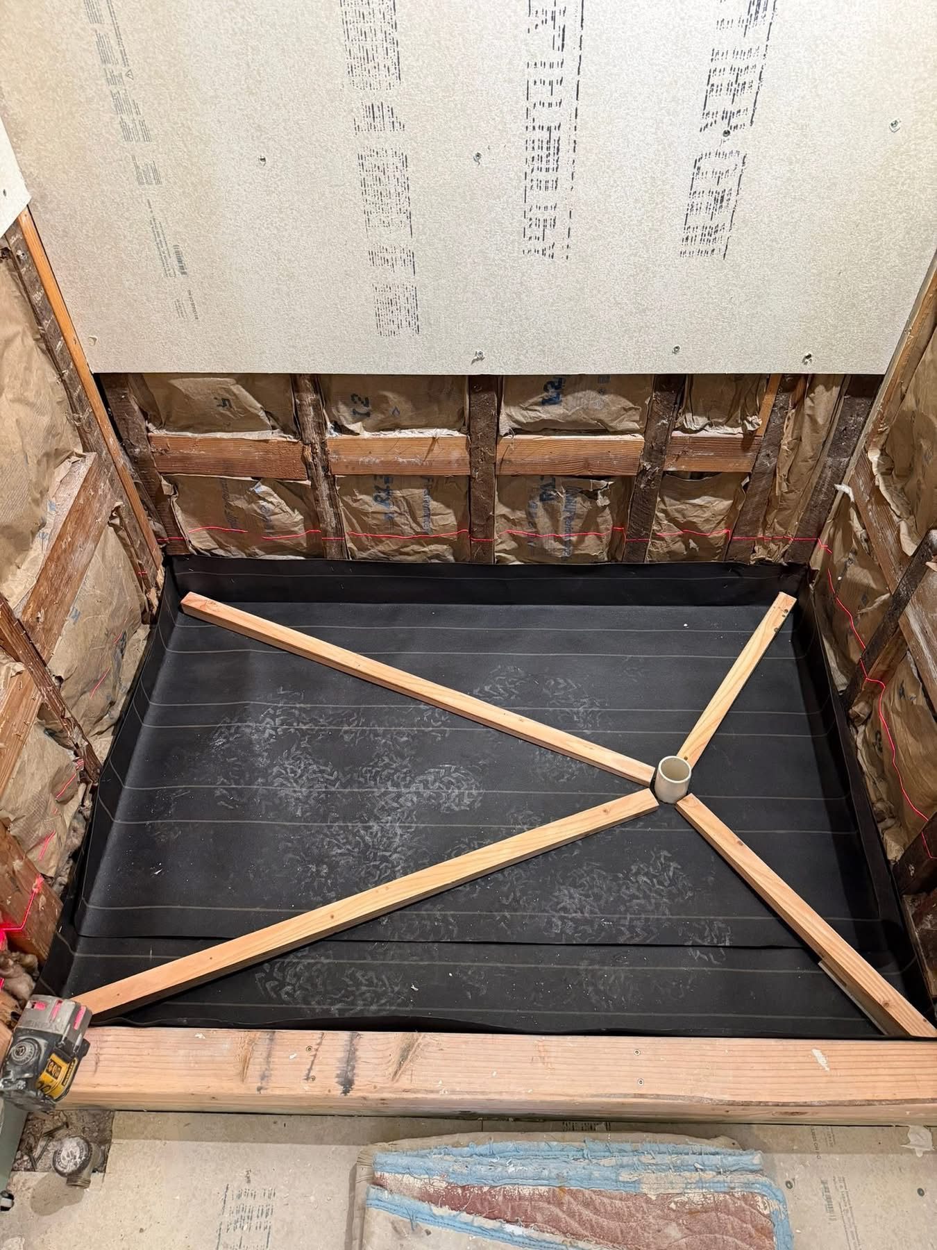 Shower pan liner + pebble tile sample