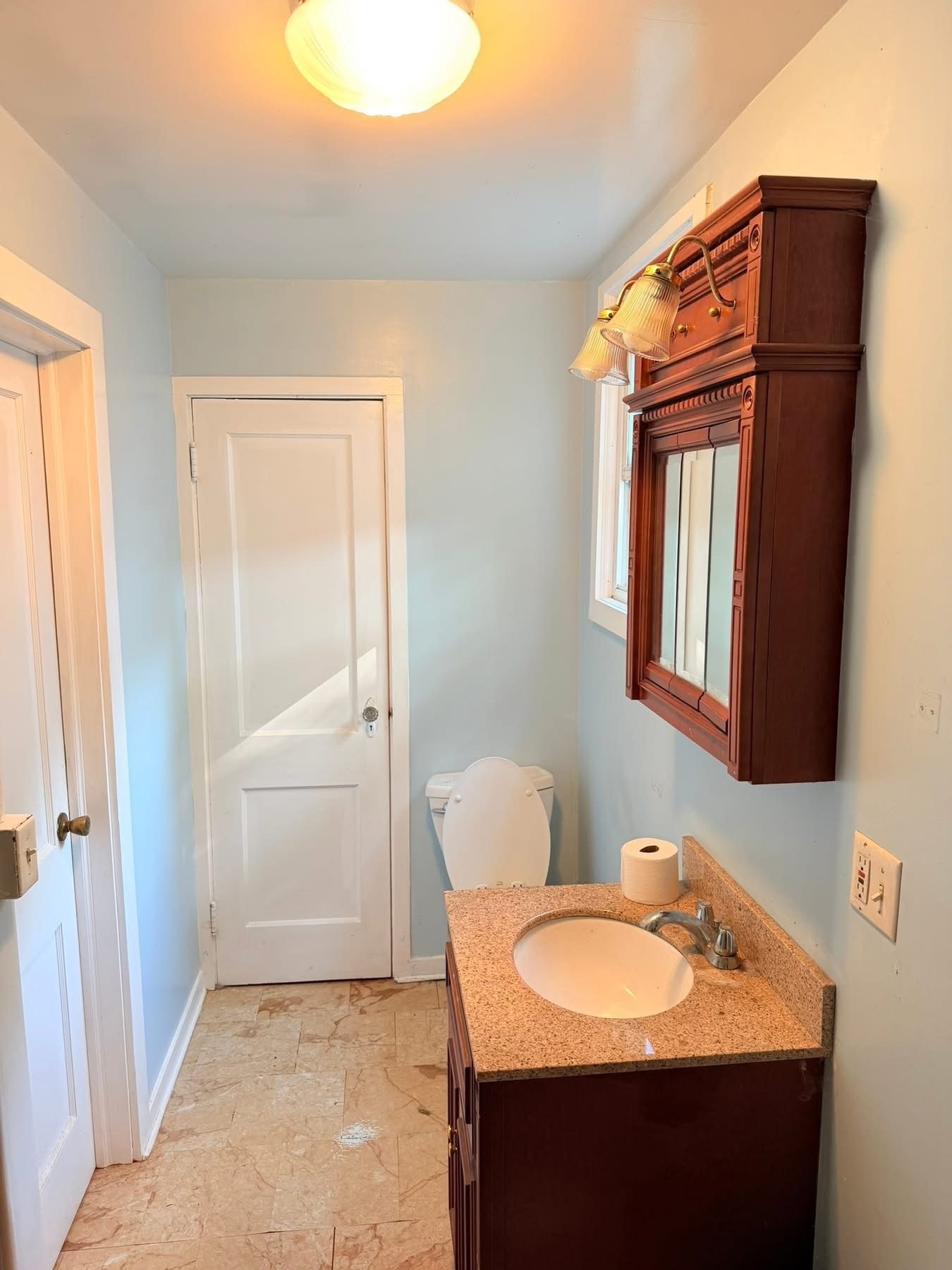 Before: full bathroom view ready for gut renovation